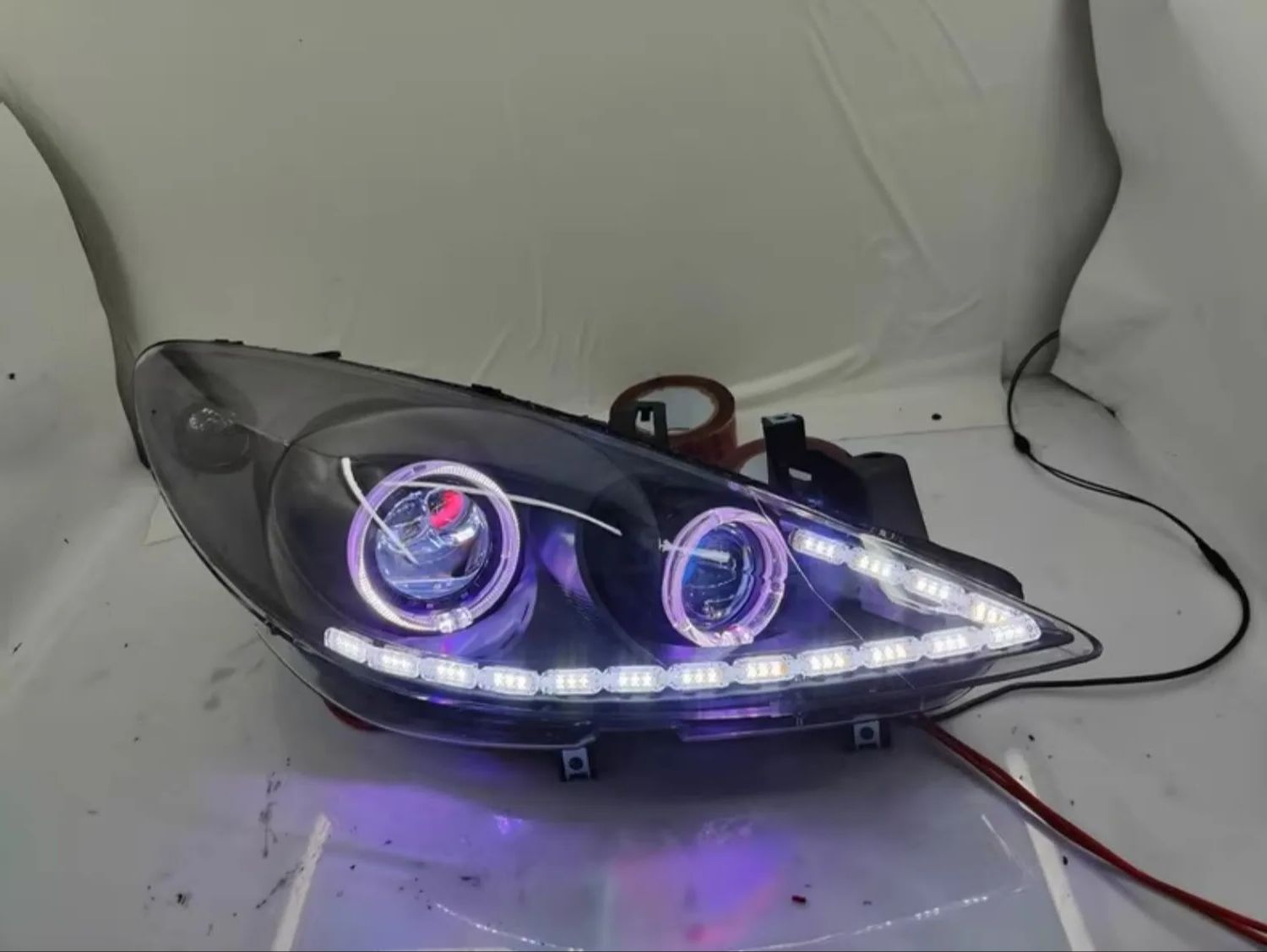 LED المزدوج شعاع عدسة المصباح  - مراجعة Running Headlamp وسعره