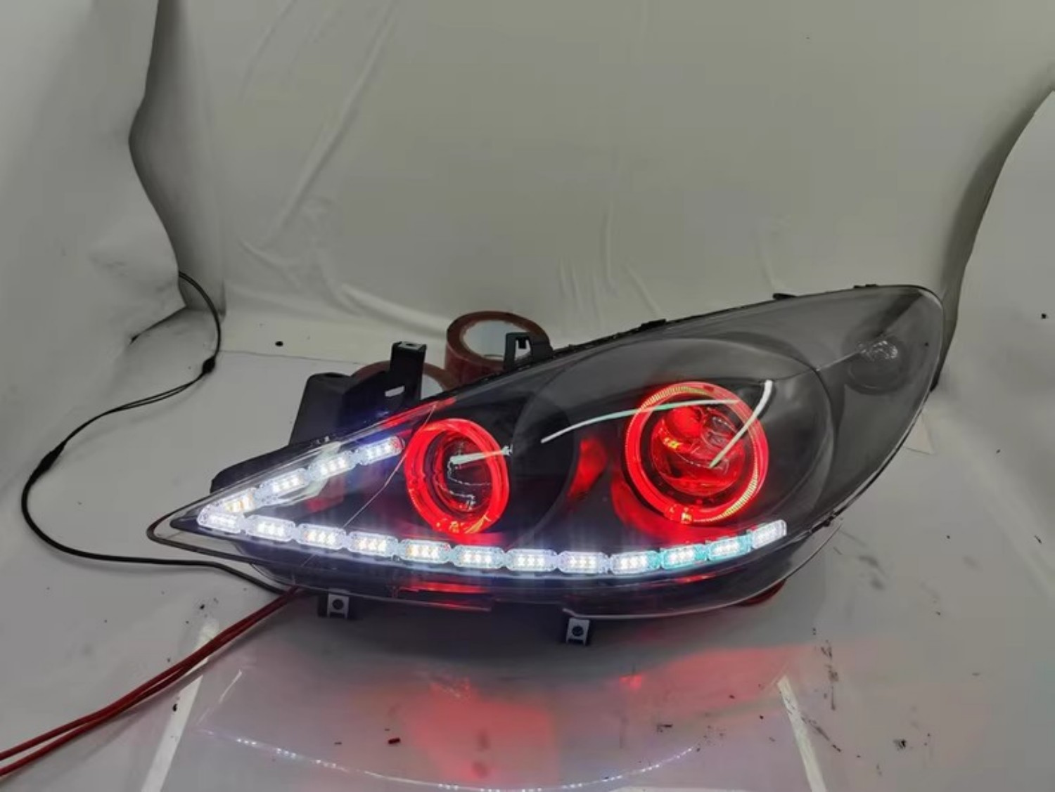 LED المزدوج شعاع عدسة المصباح  - مراجعة Running Headlamp وسعره