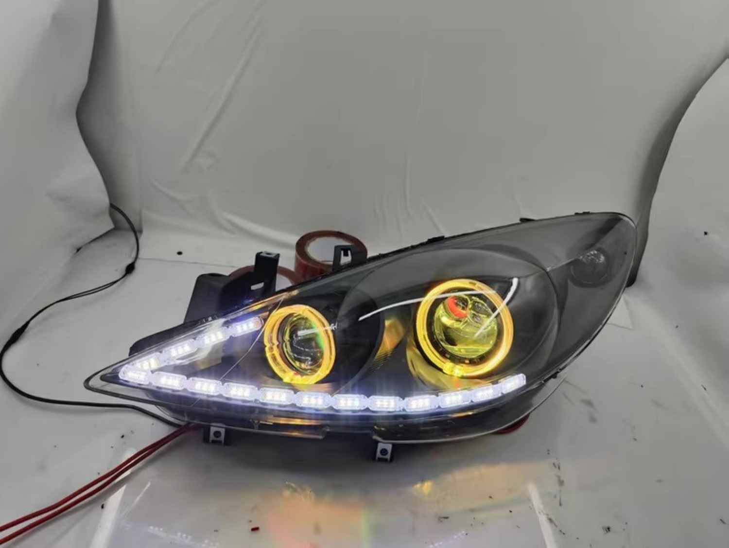 LED المزدوج شعاع عدسة المصباح  - مراجعة Running Headlamp وسعره